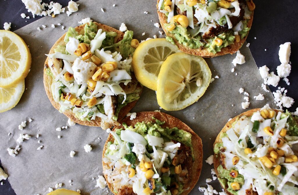 Crispy Spiced Fish Tostadas with Avocado Mash and Feta Slaw