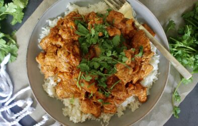 Super saucy, a tad spicy, and packed with all the cozy flavors of Indian cuisine, this Healthy Indian Spiced Chicken and Cauliflower is lightened up comfort food at its best!