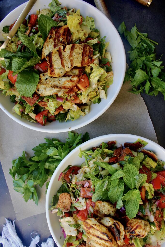 With crispy pita chips, perfectly charred halloumi cheese, and the best Greek fixins, this Charred Halloumi Fattoush Salad with Homemade Pita Chips is everything!!