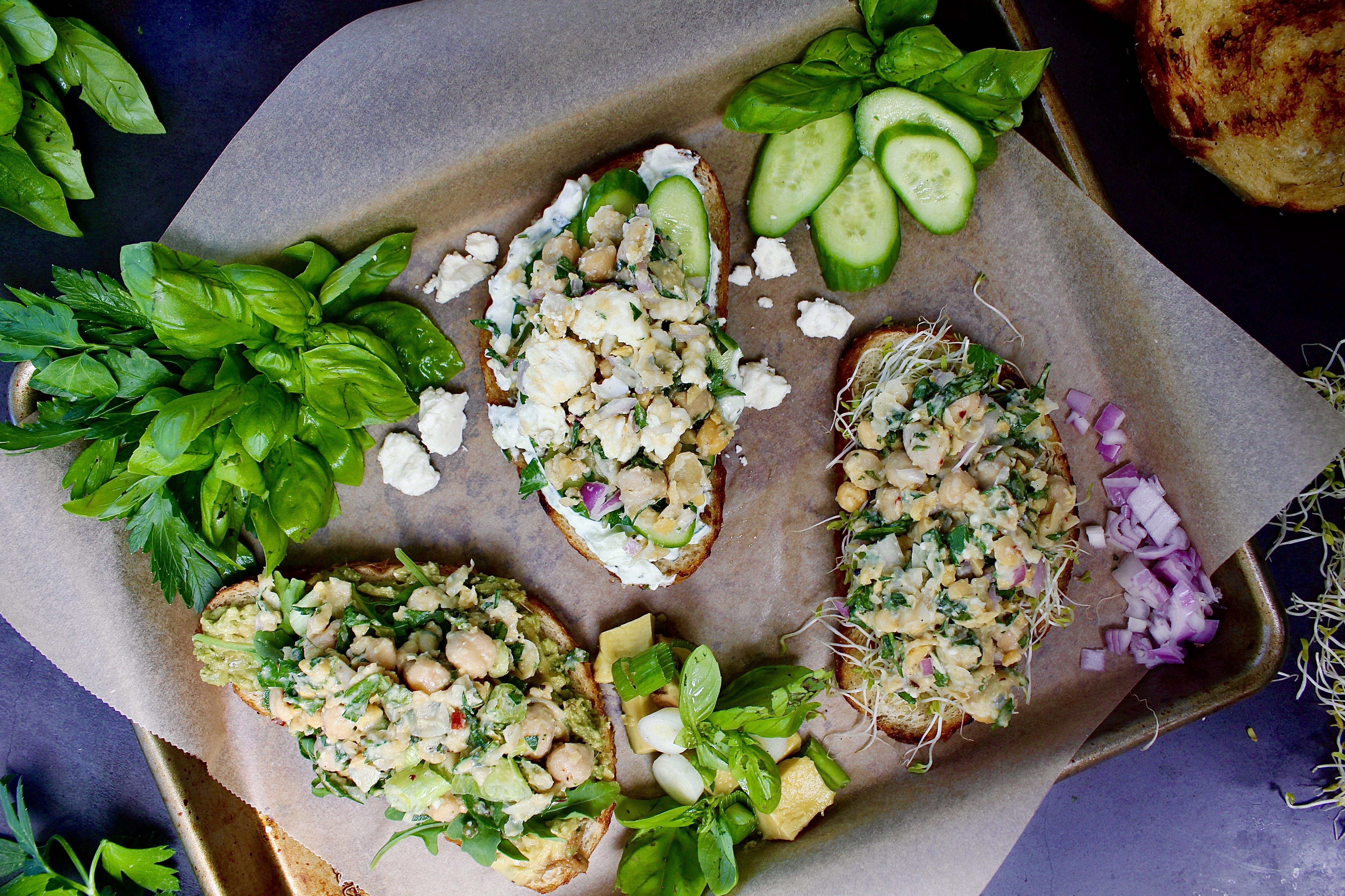 With a delicious base of mashed chickpeas, fresh herbs, and all the flavors, these Lemon Herb Chickpea Salad Tartines Three Ways take your traditional toast above and beyond!