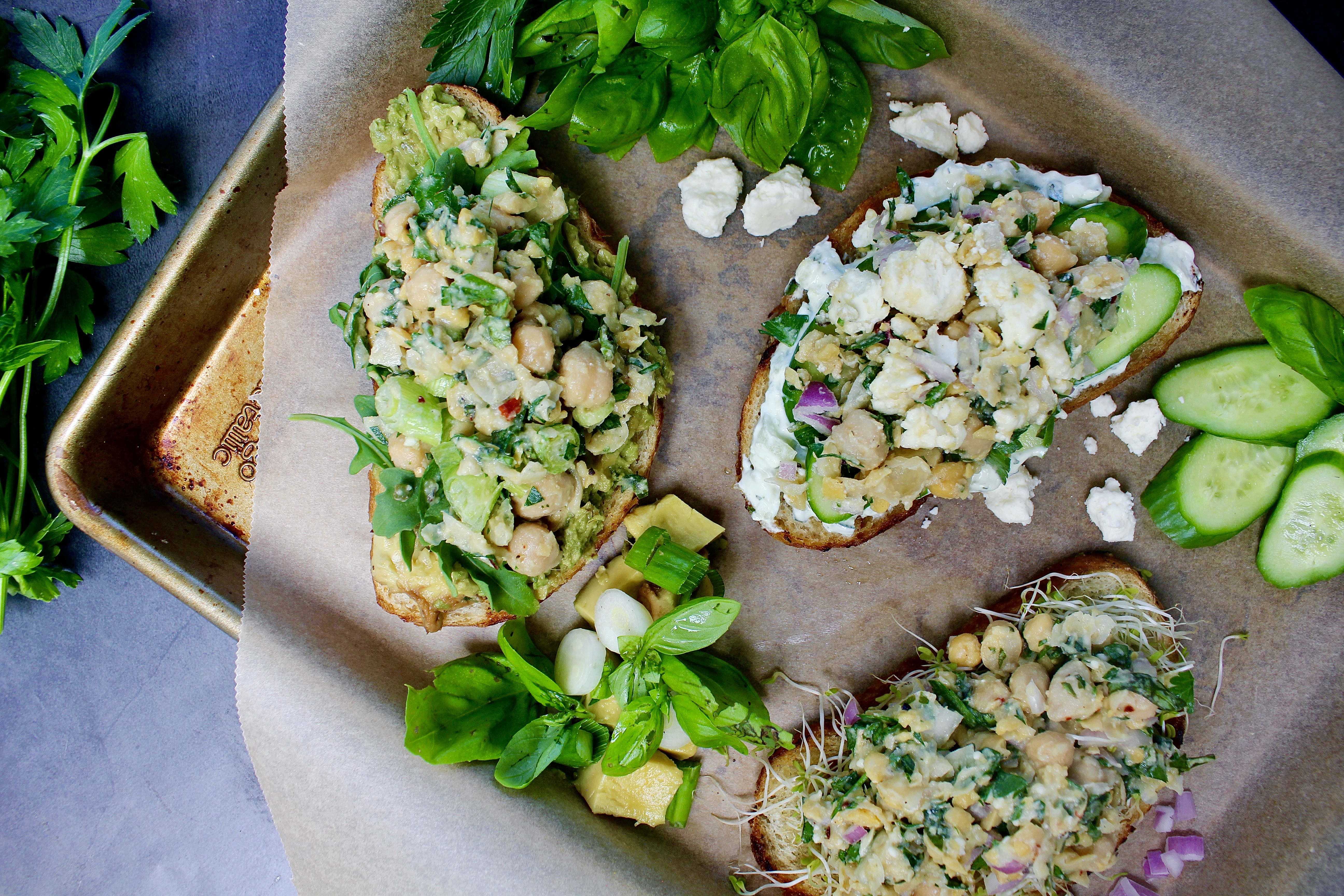 On Annie's Menu - With a delicious base of mashed chickpeas, fresh herbs, and all the flavors, these Lemon Herb Chickpea Salad Tartines Three Ways take your traditional toast above and beyond!