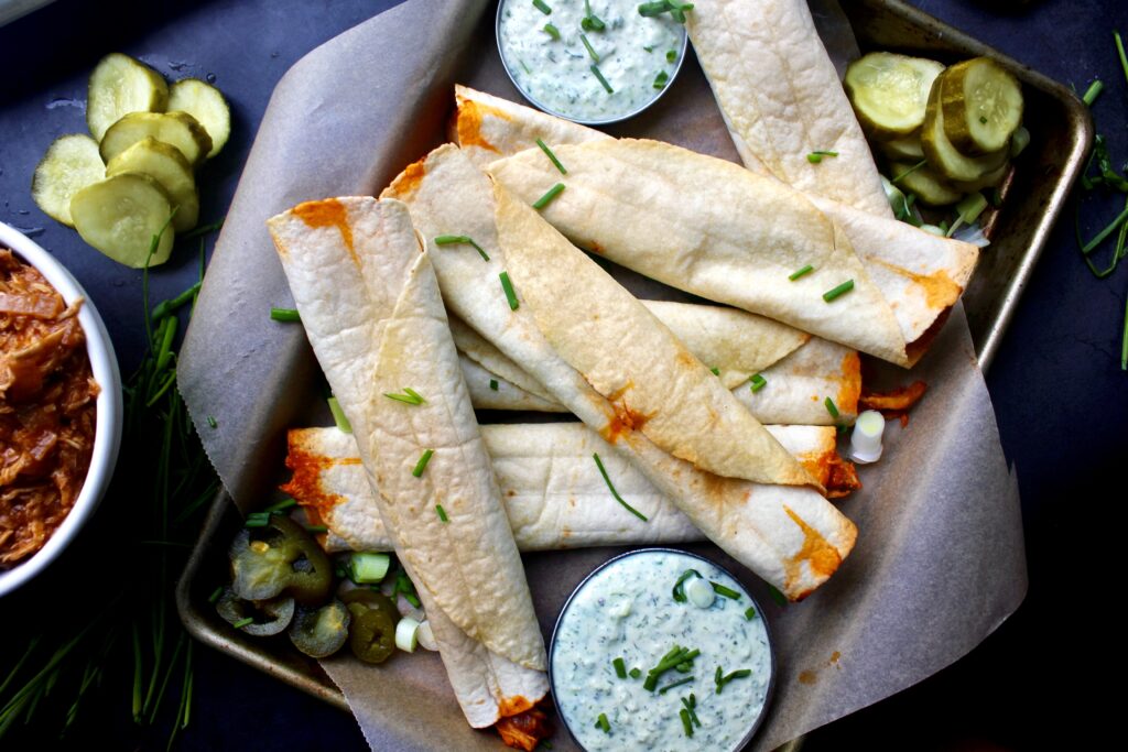 Barbecue Chicken Taquitos with Herbed Crema