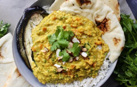 Smooth, spiced, and extra saucy lentils spooned over perfectly roasted eggplant: these Creamy Curried Lentils with Roasted Eggplant are the ultimate healthy comfort food.