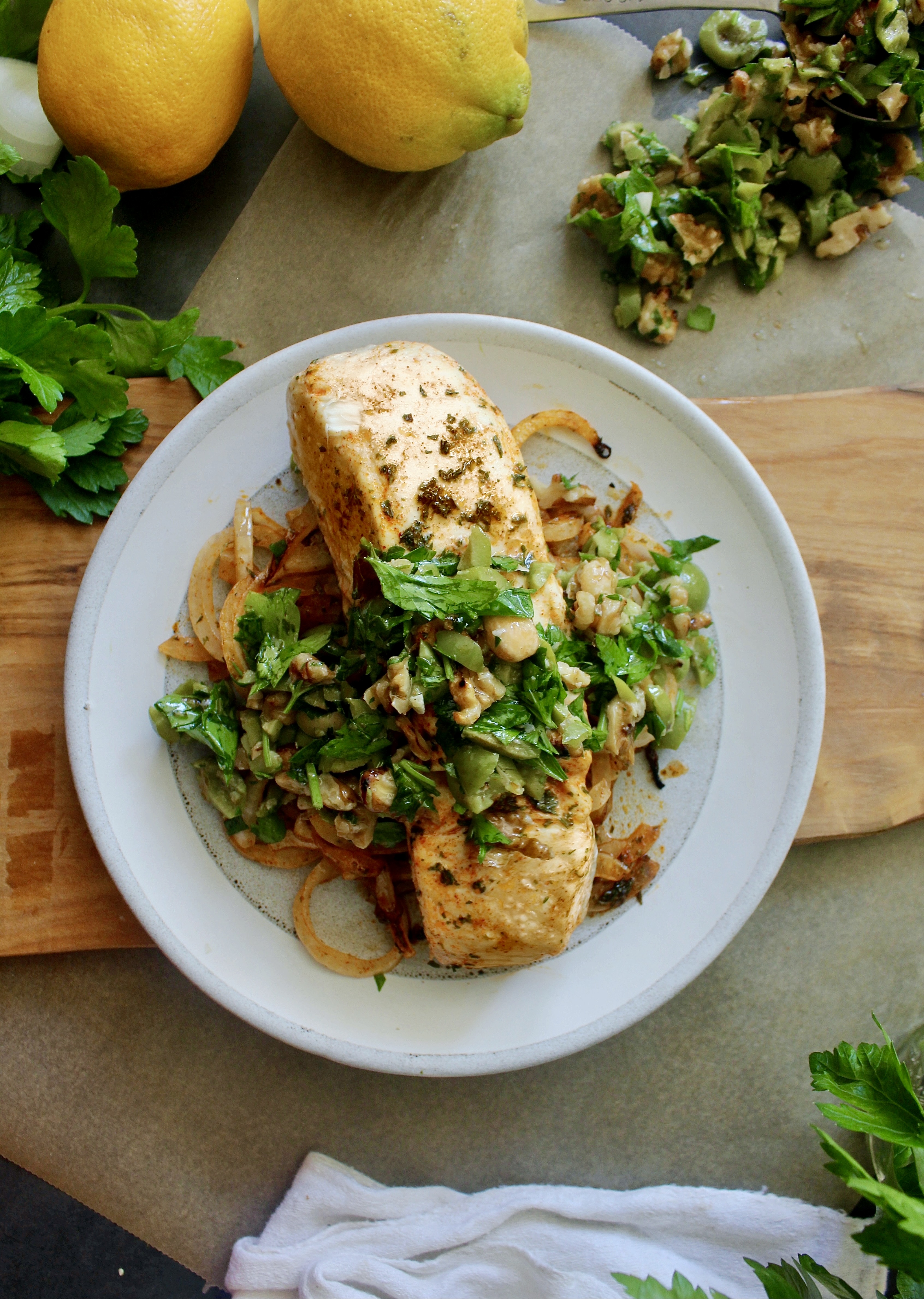 Decadent flaky fish baked in a spiced lemon oil finished off with a rich an