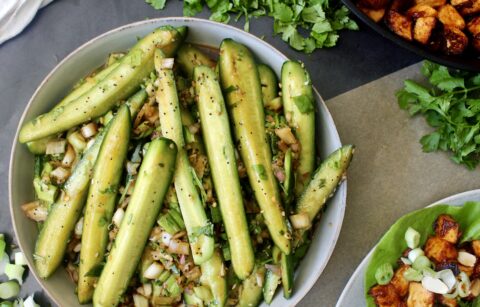 Crunchy persian cucumbers, shallots, and scallions marinated tossed with a simple sweet and tangy Asian vinaigrette with crispy sesame seeds: this Marinated Asian Cucumber Scallion Salad truly hits all the marks!