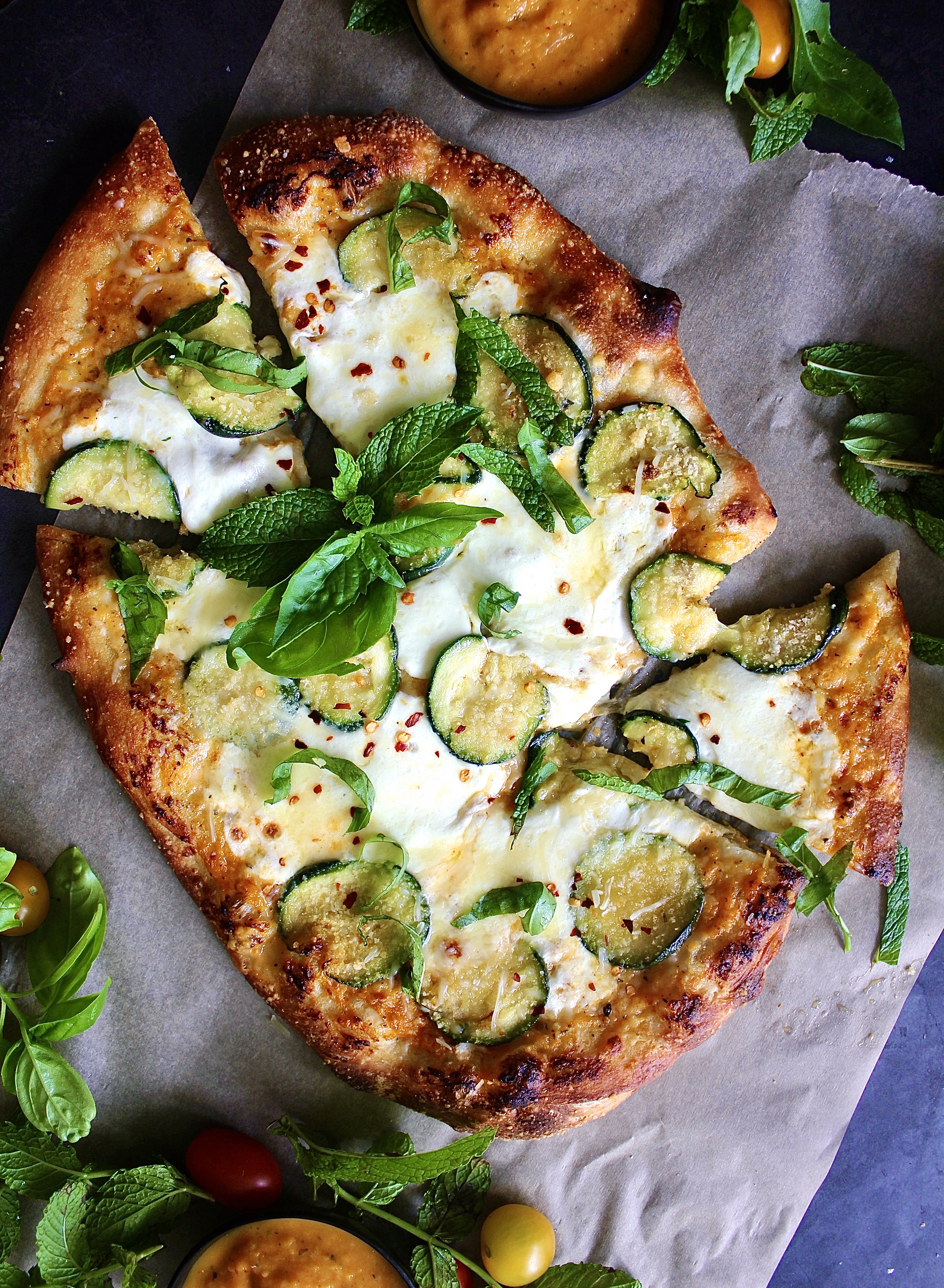  Fresh mozzarella and pecorino melted over a homemade yellow tomato sauce and finished off with crispy summer zucchini: this Pecorino Crusted Yellow Pizza with Crispy Zucchini is truly the best summer pizza.