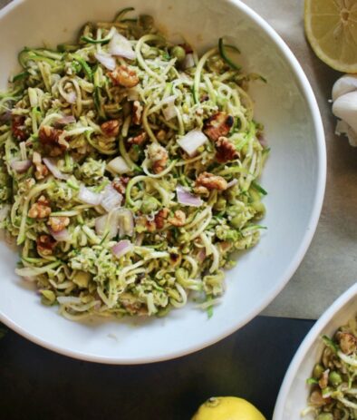 Zucchini two ways tossed with crunchy walnuts and shallots and mixed in with creamy parmesan mashed peas: this Parmesan Zucchini and Mashed Pea Salad is light, luscious, and extremely addicting.