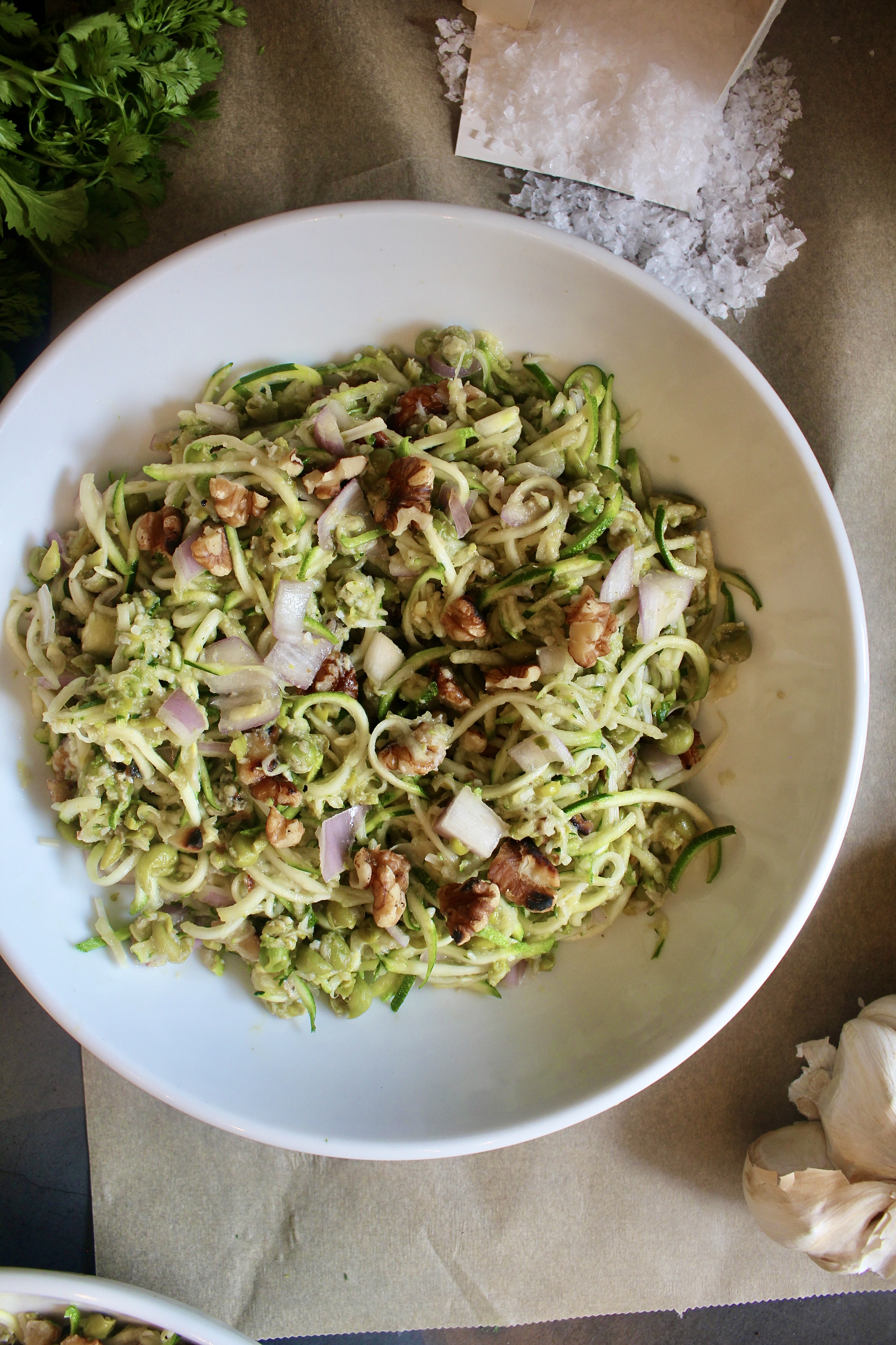 Zucchini two ways tossed with crunchy walnuts and shallots and mixed in with creamy parmesan mashed peas: this Parmesan Zucchini and Mashed Pea Salad is light, luscious, and extremely addicting. 