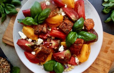 Crispy, spiced bite sized salmon tossed a simply dressed heirloom tomatoes, corn, and farro salad: this Blackened Salmon Bite Summer Farro Salad is a weekly staple this time of year!!