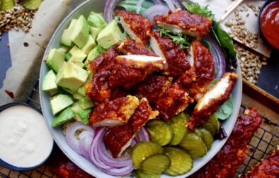 A lighter take on the classic crispy southern chicken all chopped up in a bowl with your fav sweet and spicy toppings: these Healthier Nashville Hot Chicken Bowls are my everything!!