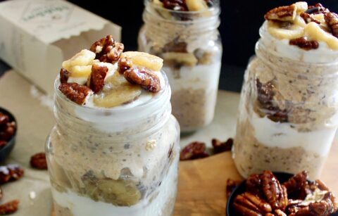 Creamy maple overnight chia oats layered with caramelized bananas and homemade candied pecans: these Banana Maple Pecan Overnight Oat Chia Parfaits are the ultimate breakfast.