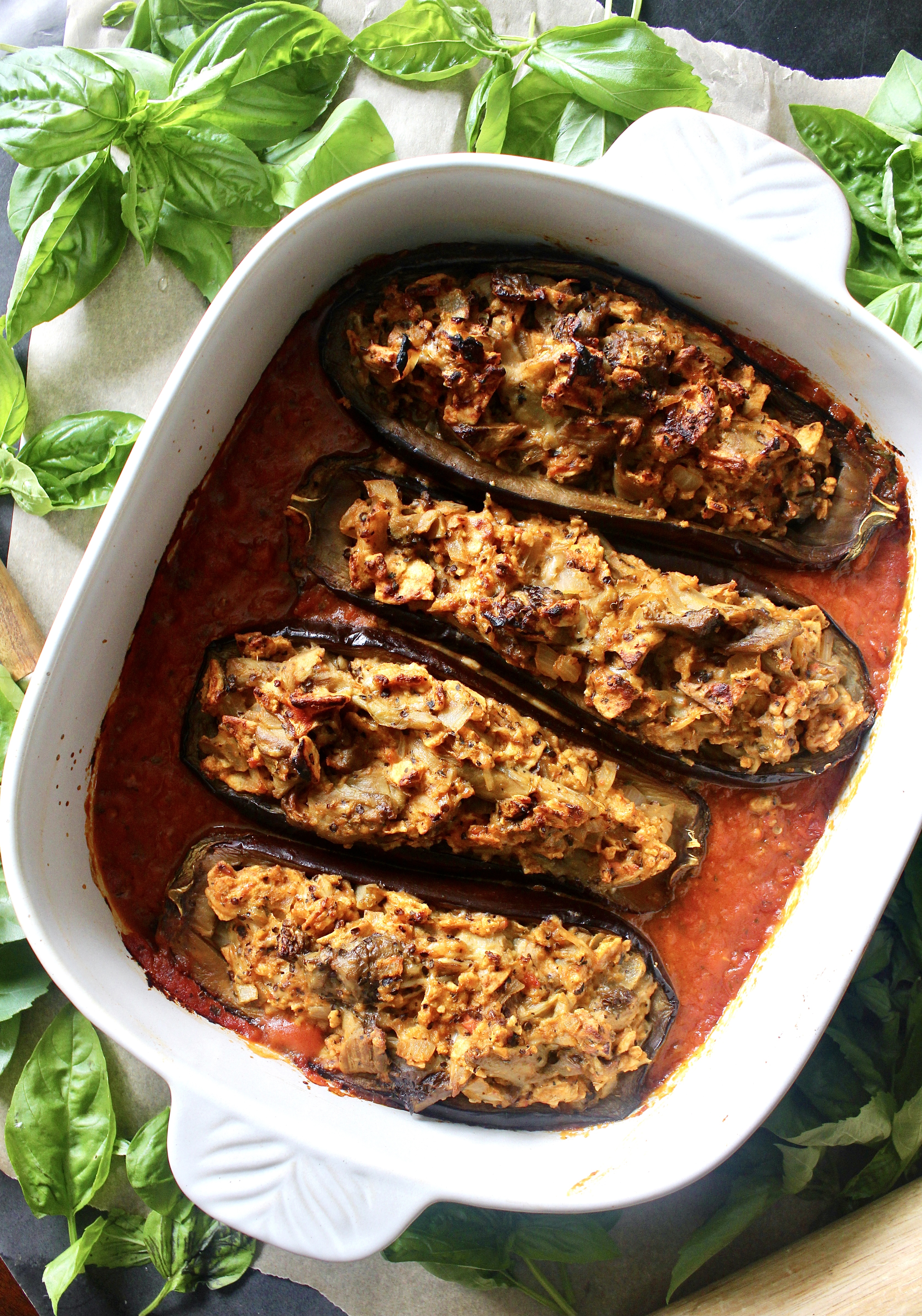 Slow roasted eggplant tossed with parmesan cheese, pulsed crackers, and all the good flavors of Italy: these Healthier Italian Stuffed Eggplants will truly warm your soul.