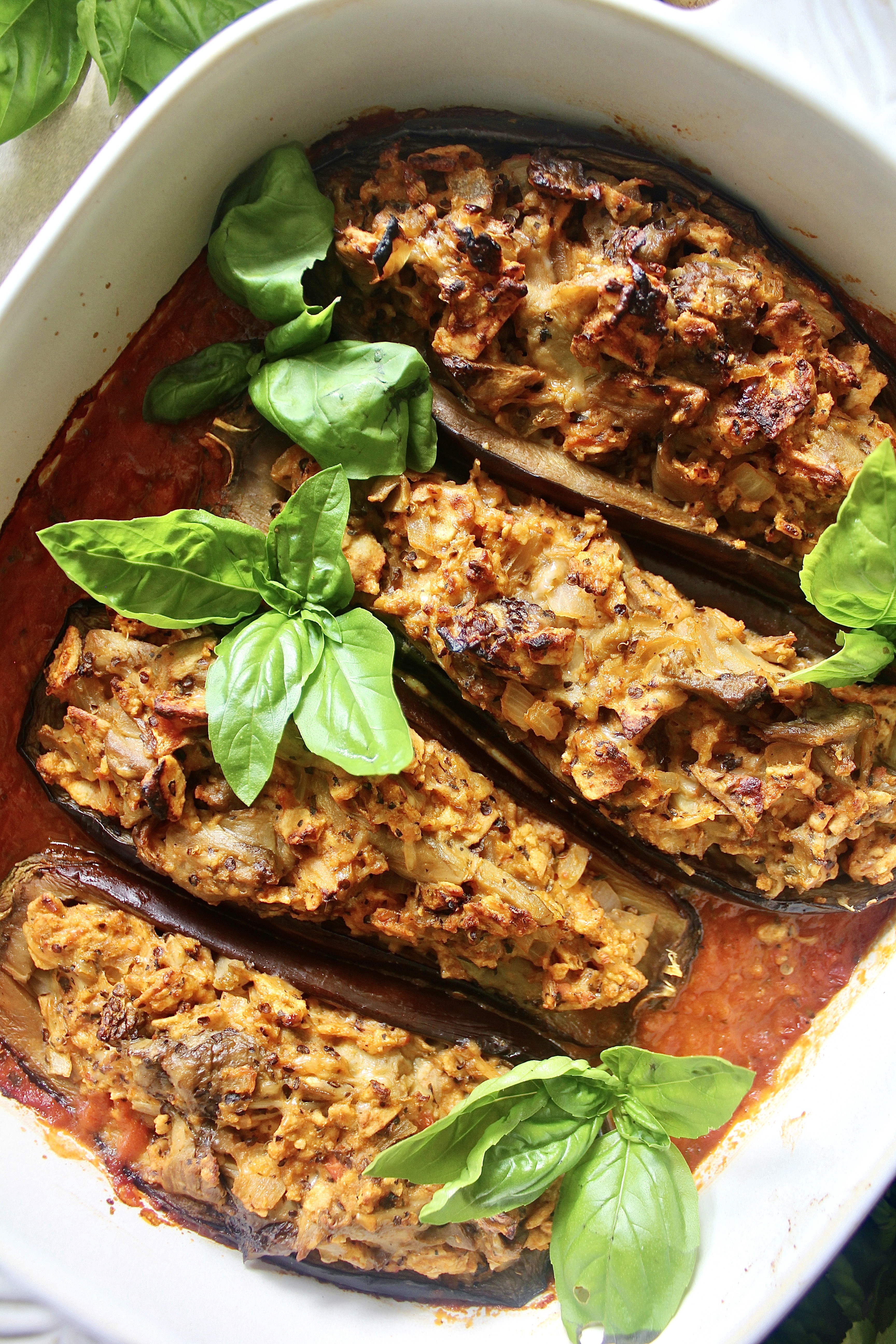 Slow roasted eggplant tossed with parmesan cheese, pulsed crackers, and all the good flavors of Italy: these Healthier Italian Stuffed Eggplants will truly warm your soul.