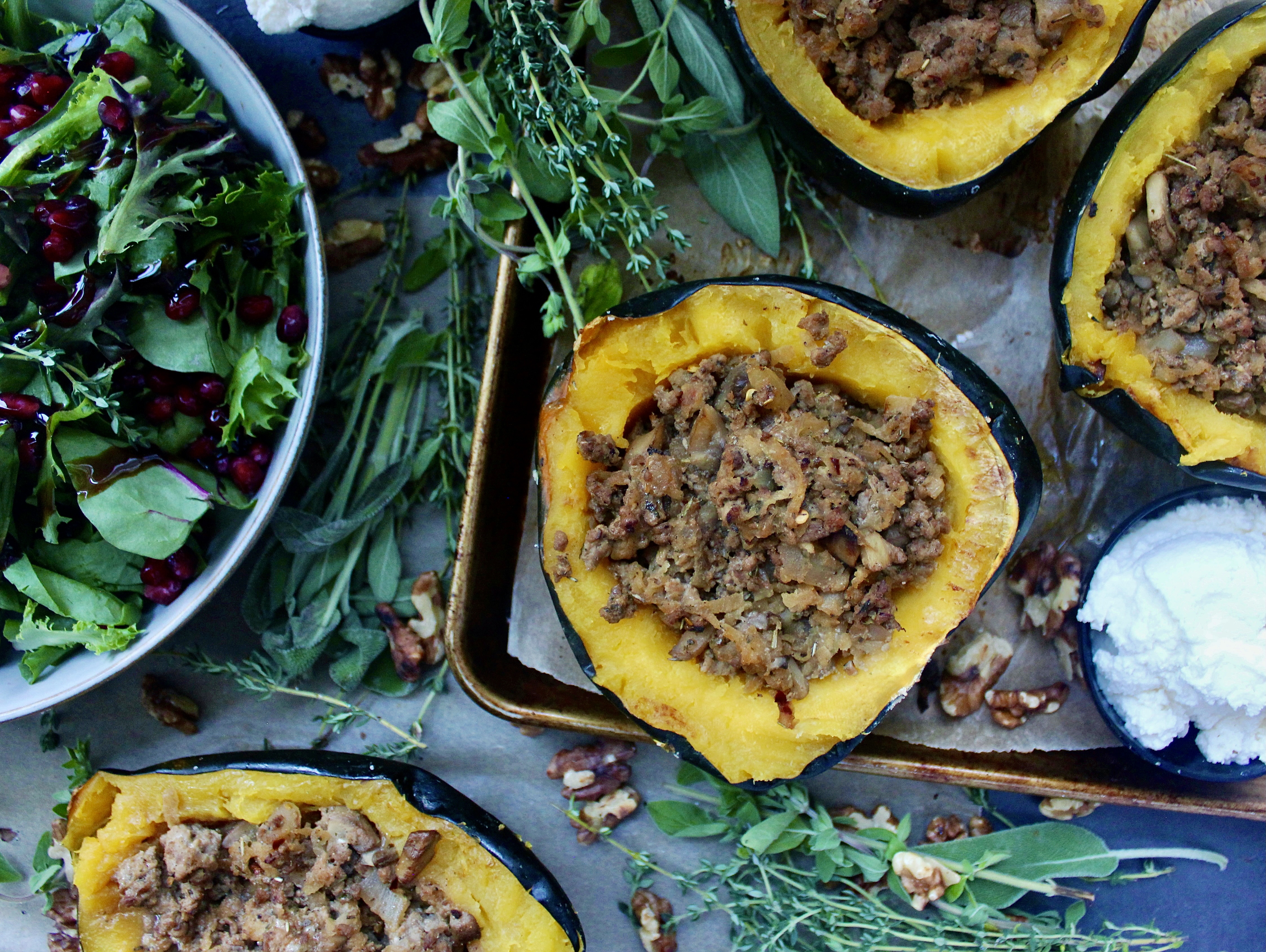 A cozy, spiced turkey, mushroom, and shredded apple filling mixed up with parmesan cheese and stuffed into roasted squash: this Turkey Apple Stuffed Acorn Squash is the best fall meal!!