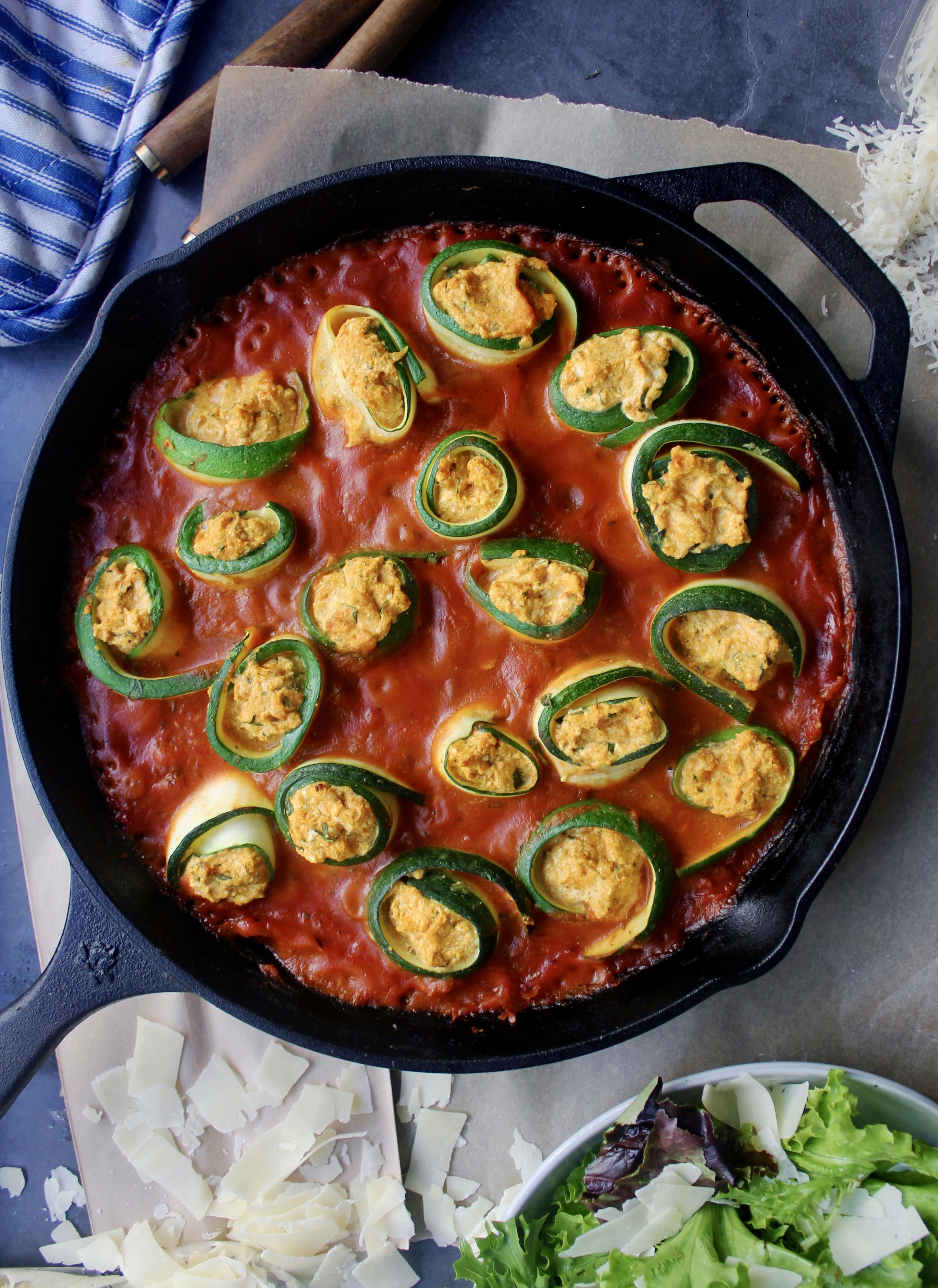 An herby pumpkin and cheese filling rolled up in zucchini and baked up in an autumn inspired sauce: this Creamy Ricotta and Pumpkin Zucchini Rollatini is the easiest cozy dinner!