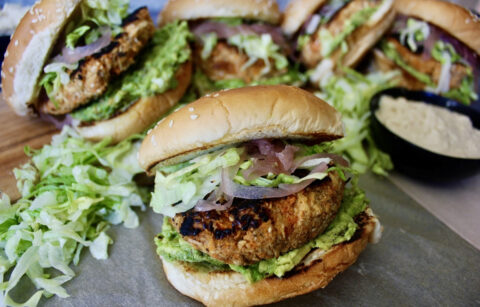 Juicy pulled chicken folded in with warming spices, sweet potato, and tahini topped off with avocado and pickled onions: these Sweet Potato Pulled Chicken Tahini Burgers are an all time fav!!