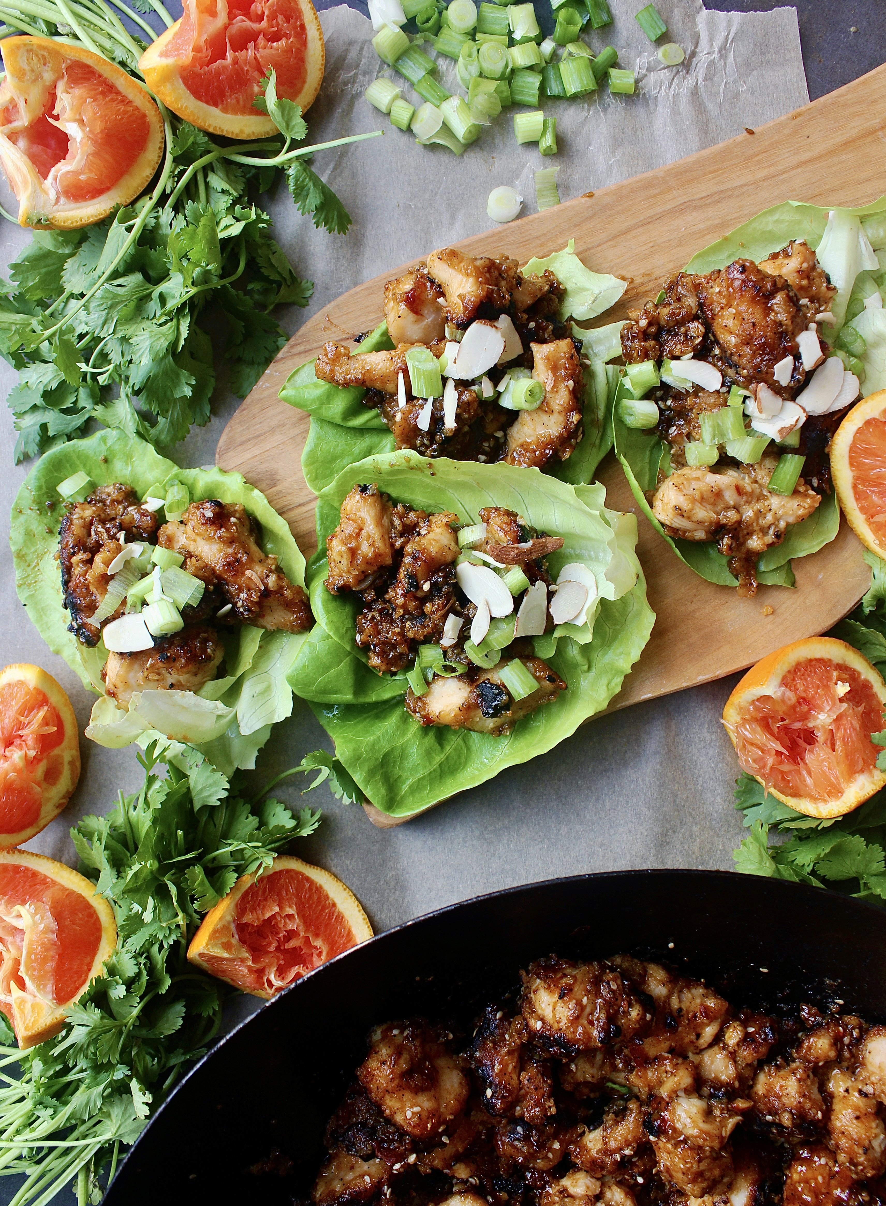 Crispy, crunchy, and super saucy orange sesame chicken folded up into a lettuce wrap with all the textures: these Chinese Orange Chicken Lettuce Wraps are seriously better than takeout!!