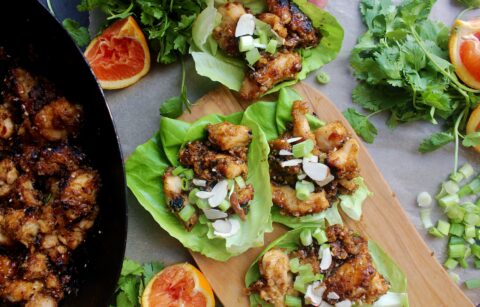 Crispy, crunchy, and super saucy orange sesame chicken folded up into a lettuce wrap with all the textures: these Chinese Orange Chicken Lettuce Wraps are seriously better than takeout!!