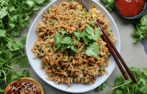Tons of stir fried veggies, all the good Asian sauces, and extremely garlicky caramelized onions all mixed up in your favorite rice: My Everyday Healthier Fried Rice is truly the Asian side I make every week.