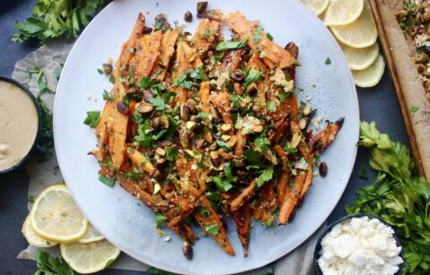 Twice baked, crispy cheese smashed carrots tossed with all the parmesan cheese, fresh parsley, and toasty pistachios: these Parmesan Pistachio Smashed Carrots are the best vegetable side dish. #onanniesmenu #delish #eathealthy #healthyrecipes #eatrealfood #easydinner #easymeal #foodporn #healthyish #eatwellbewell #realfoodz #wholefoodie #glutenfree #familydinner #goodeats #fuel #paleo #healthyfoods #foodblog #foodcoma #comfortfood #weeknightdinner