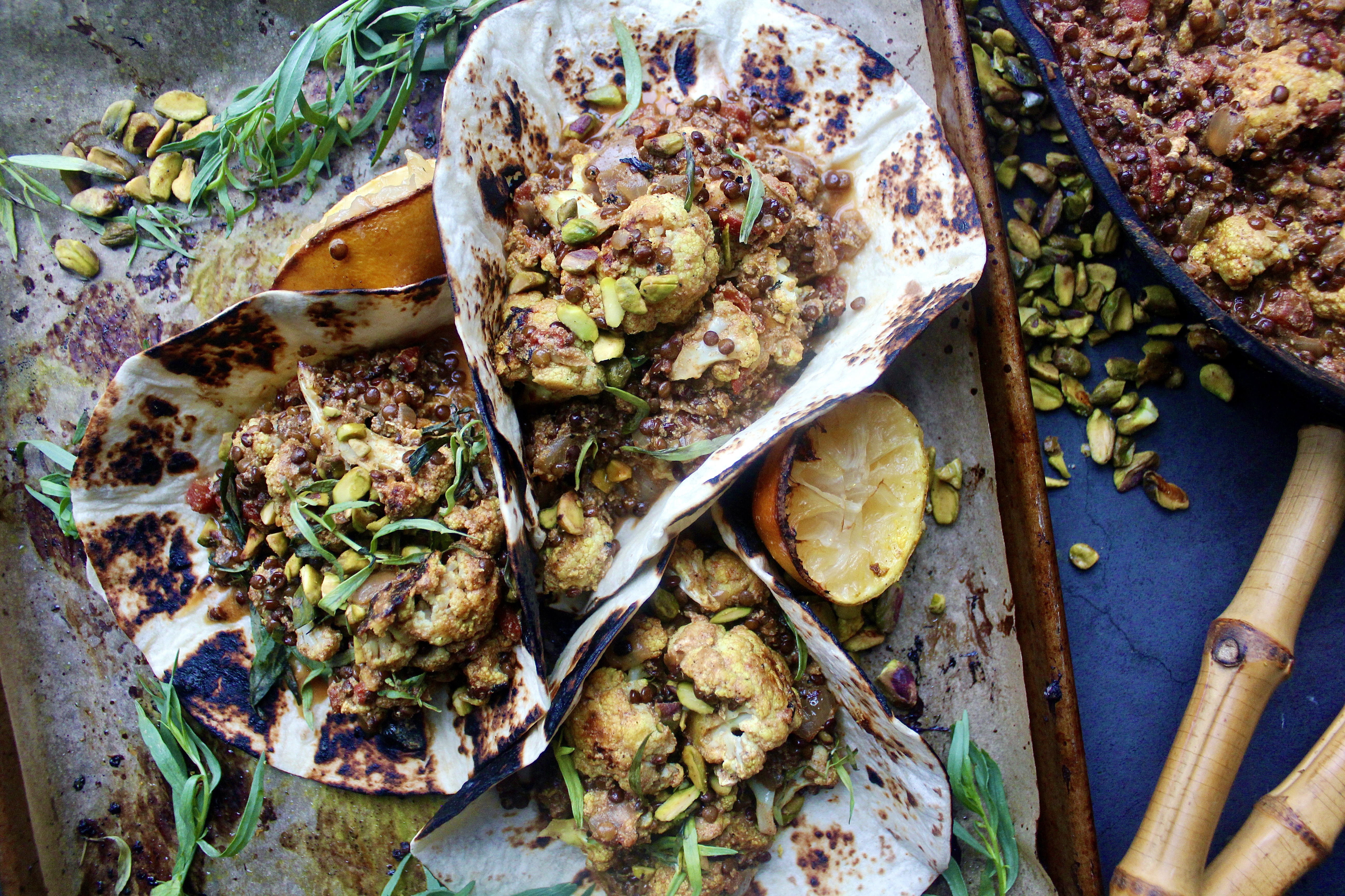 Crispy roasted cauliflower baked down with lentils in a cozy, spiced yellow curry ginger sauce: these Easy Cauliflower and Lentil Korma Tacos are the best weeknight comfort food. 