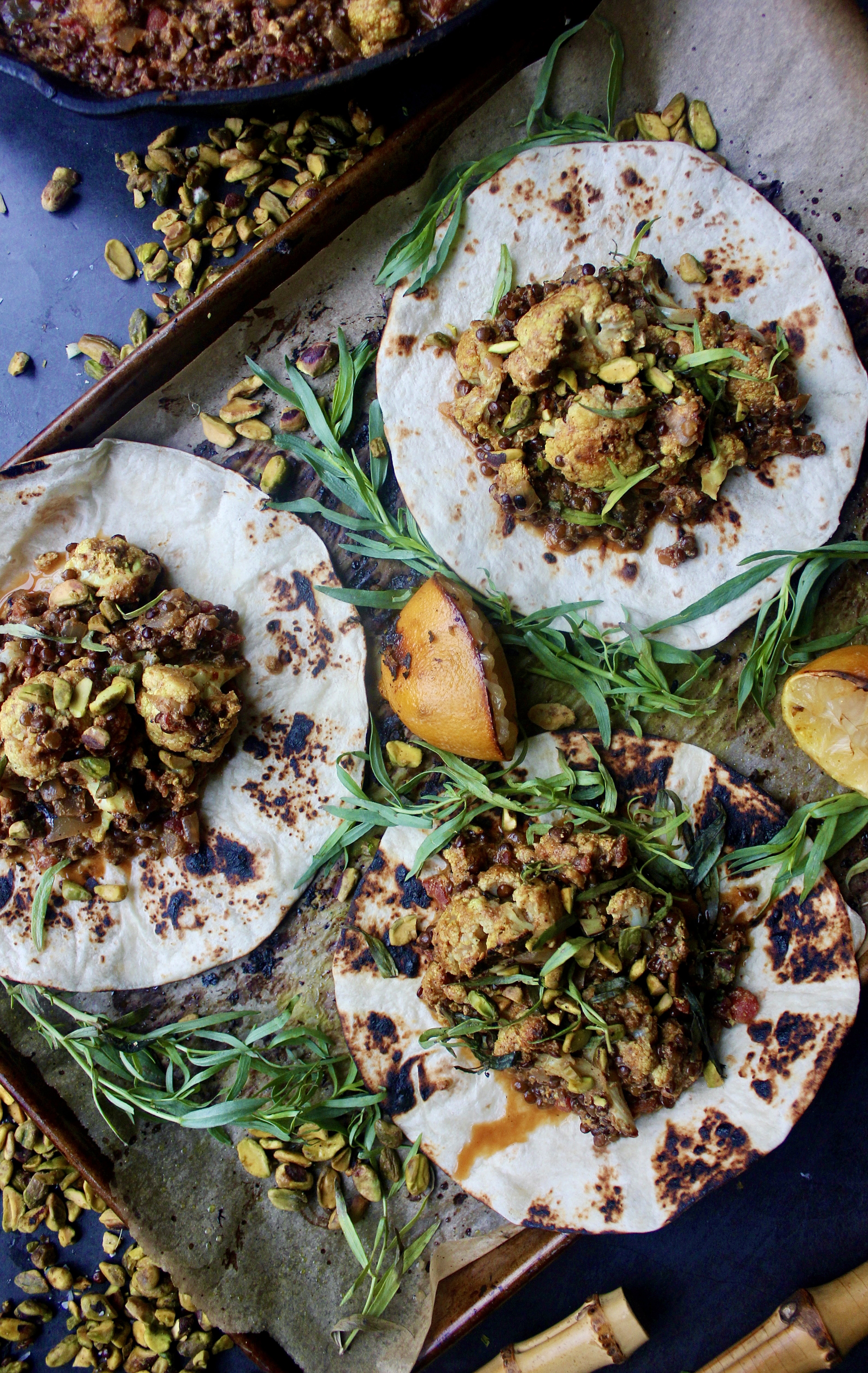 Crispy roasted cauliflower baked down with lentils in a cozy, spiced yellow curry ginger sauce: these Easy Cauliflower and Lentil Korma Tacos are the best weeknight comfort food. 