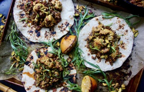 Crispy roasted cauliflower baked down with lentils in a cozy, spiced yellow curry ginger sauce: these Easy Cauliflower and Lentil Korma Tacos are the best weeknight comfort food.