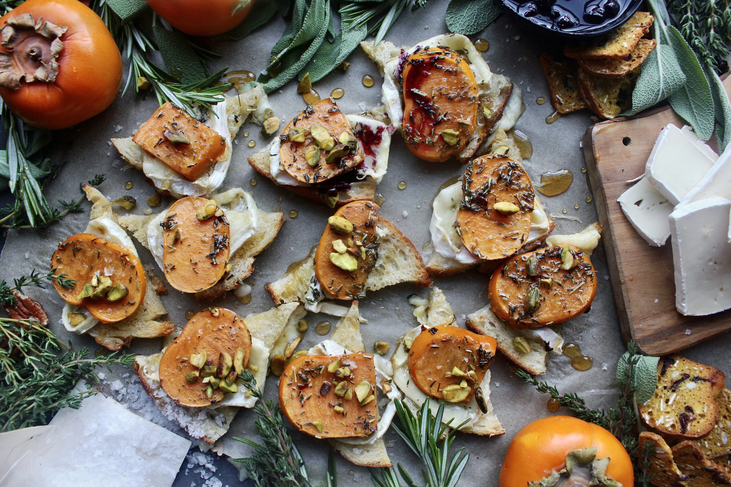 Golden, crispy sourdough toast topped with melty brie and quick marinated persimmons: these Baked Brie Persimmon Tartines are my favorite fall appetizer.