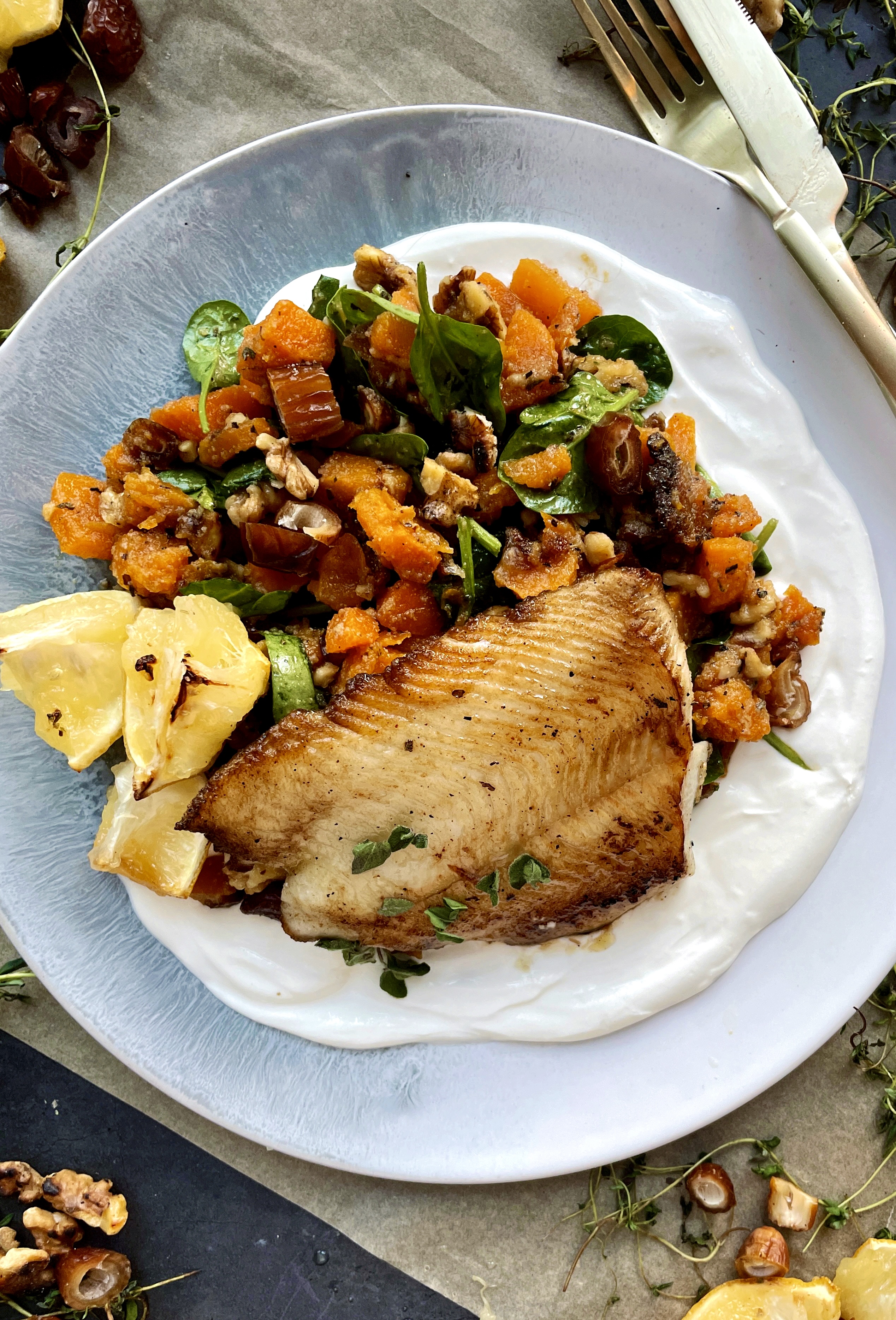 A crisp, golden fillet of sea bass over a bed of creamy whipped ricotta and a sweet and salty roasted butternut squash hash: this Caramelized Butternut Squash and Whipped Ricotta Sea Bass is simplicity at its finest. 