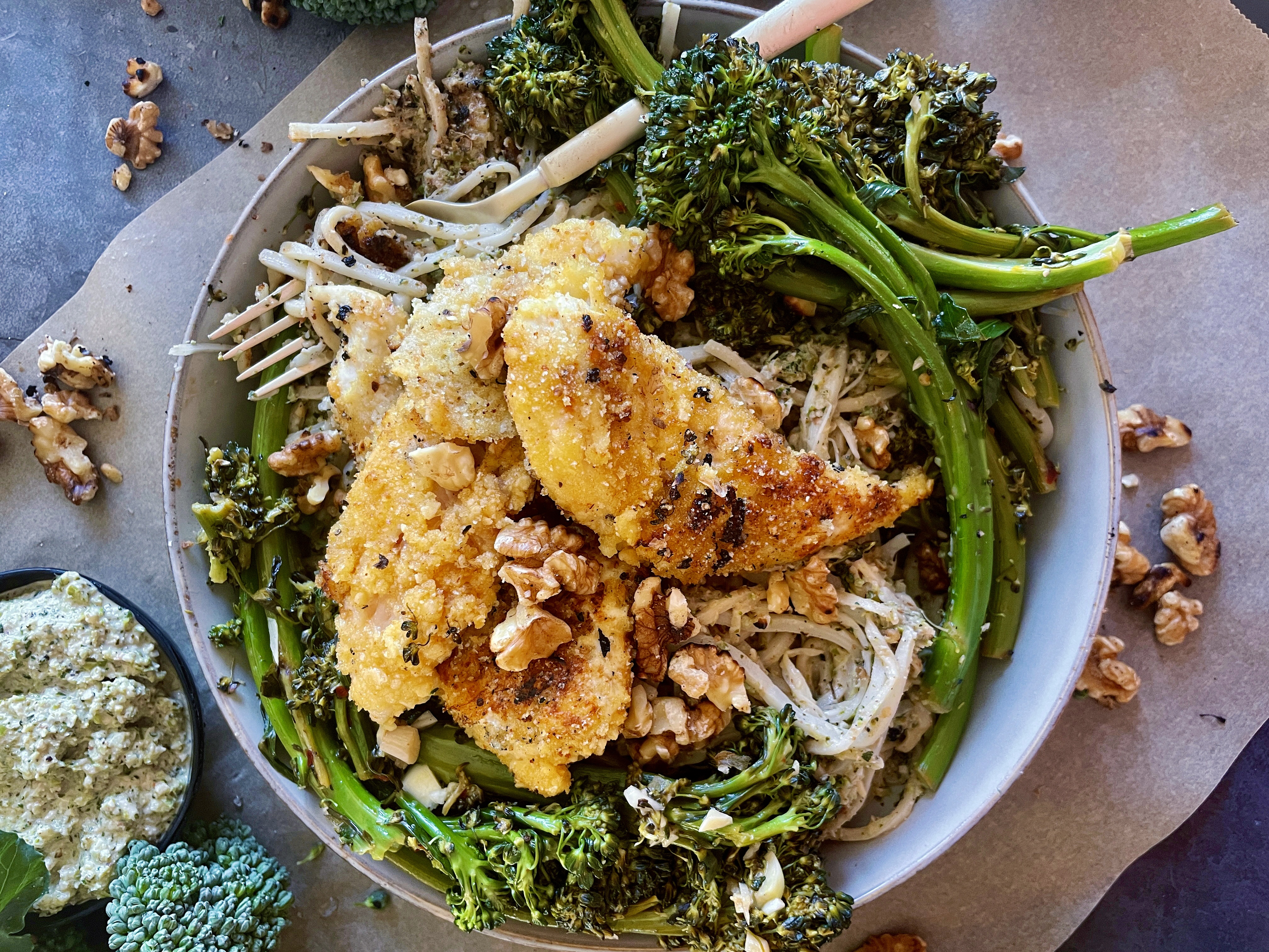 A creamy, sharp parmesan pesto pasta topped with crispy pan seared broccolini and chicken: this Crispy Chicken and Broccolini Pesto Linguine is a compilation of all my favorite things.