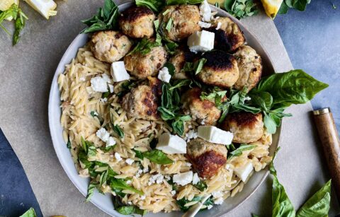 Crispy seared meatballs tucked into a creamy orzo skillet with some salty pancetta, all the lemon, and a whole lotta parm: this Cheesy Lemon Orzo Meatball Skillet is truly the dinner we all need right now.