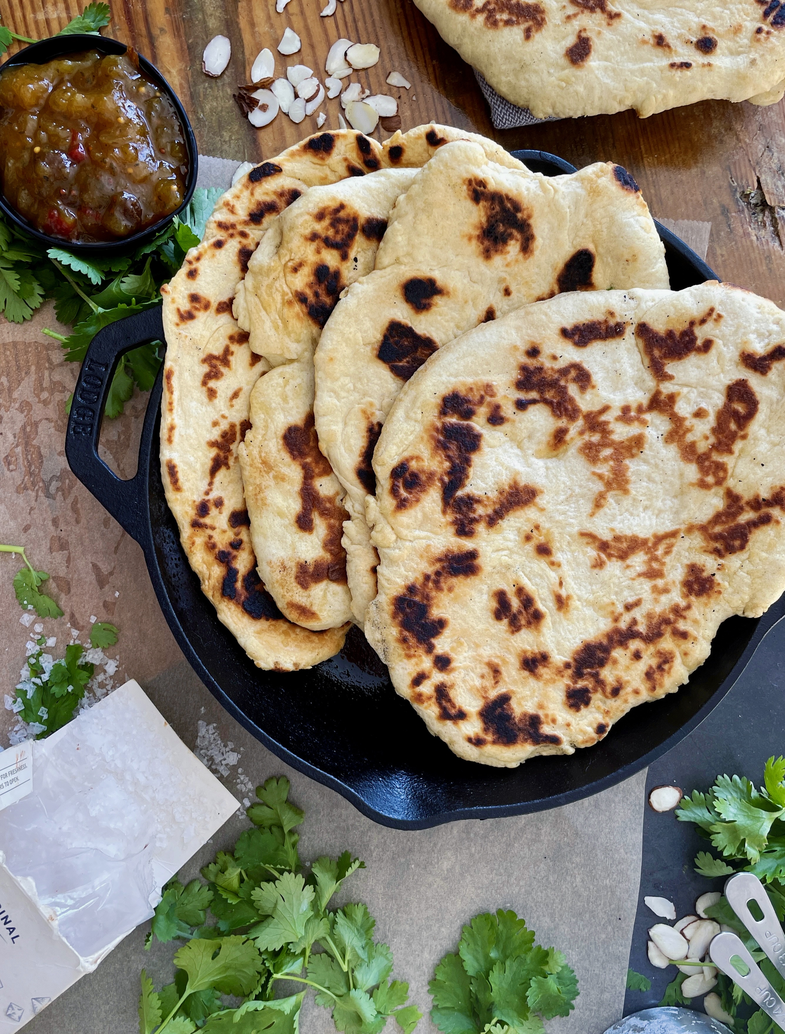 A fluffy, warm doughy exterior with crispy pan fried edges: this Easy Homemade Naan is truly a staple in my house.