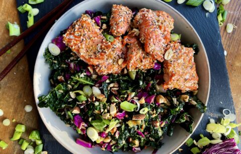 Crispy sesame and everything bagel seasoning baked salmon bites over a super simple Asian kale salad: this Sesame Salmon Bites with Sweet Chili Shredded Kale recipe is the best way to kick off the new year!