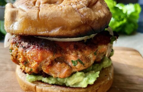Crispy, juicy, and slightly tangy salmon patties layered over an easy avocado mash and cilantro marinated onions: these Zesty Avocado Cilantro Salmon Burgers are truly a game-changing dinner.