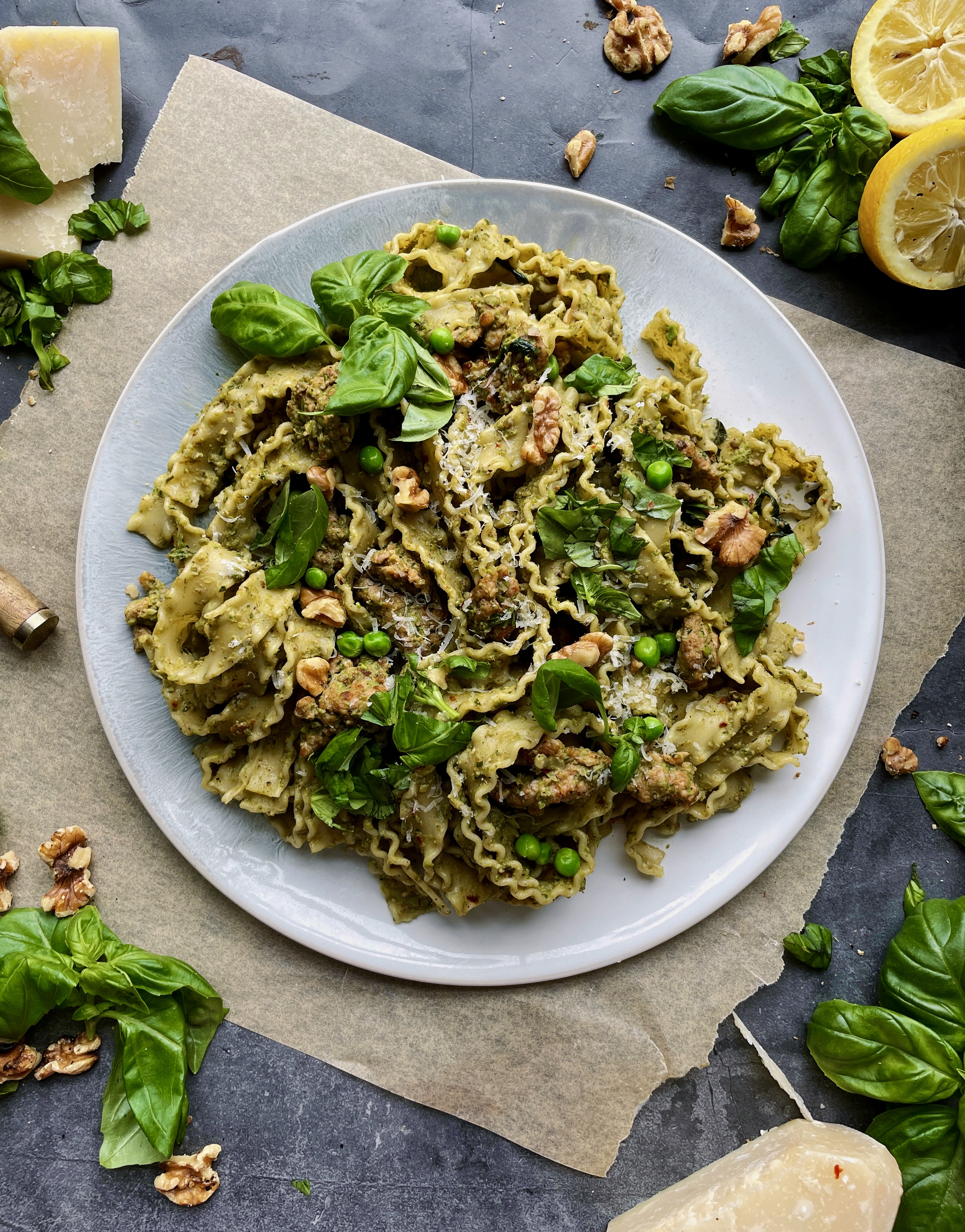 Charred, spicy, chicken sausage tossed up with a sharp parmesan, basil, and smashed pea pesto in your favorite pasta: this Spicy Chicken Sausage Pea Pesto Tagliatelle is my ultimate comfort food. 