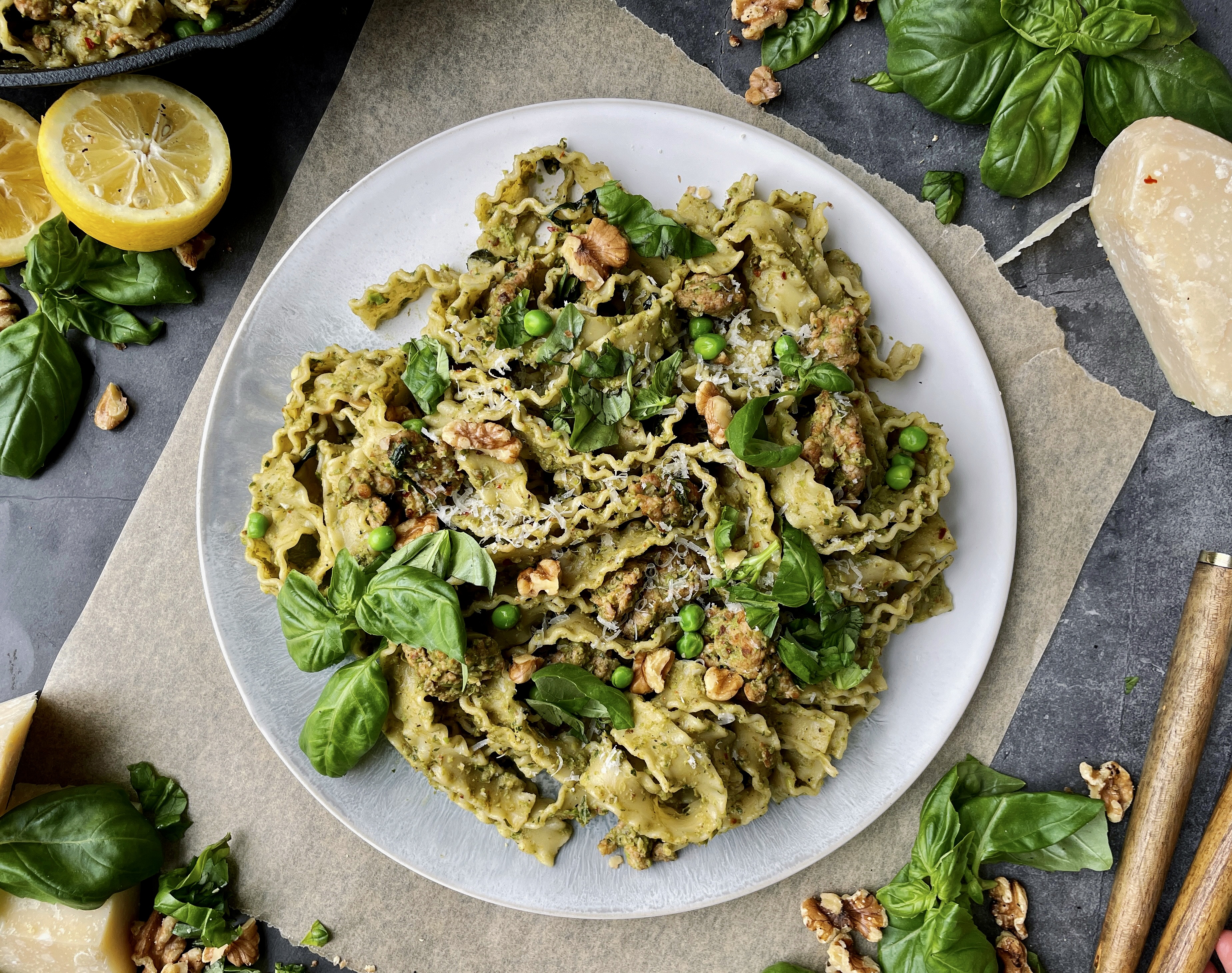 Charred, spicy, chicken sausage tossed up with a sharp parmesan, basil, and smashed pea pesto in your favorite pasta: this Spicy Chicken Sausage Pea Pesto Tagliatelle is my ultimate comfort food.