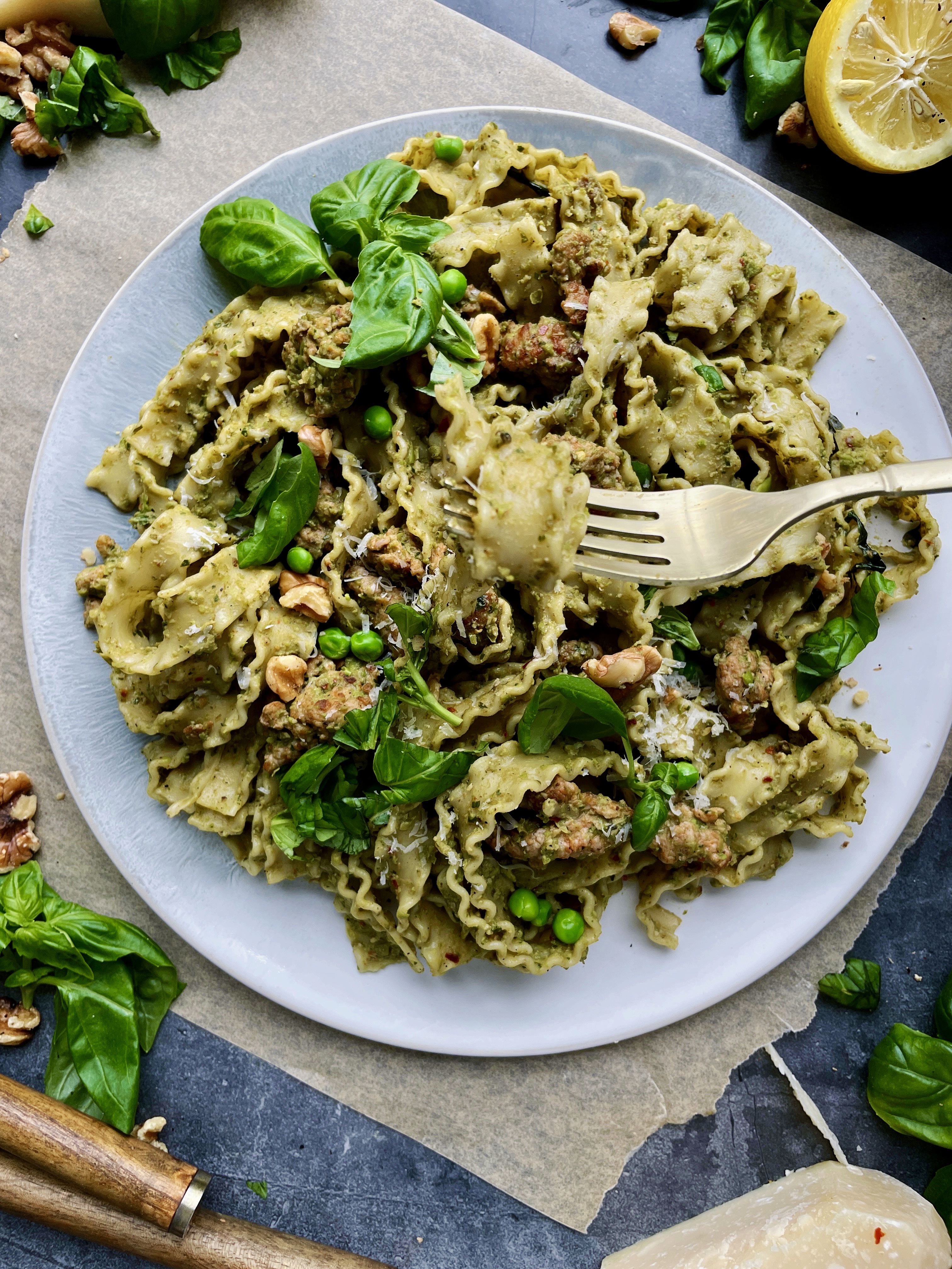 Charred, spicy, chicken sausage tossed up with a sharp parmesan, basil, and smashed pea pesto in your favorite pasta: this Spicy Chicken Sausage Pea Pesto Tagliatelle is my ultimate comfort food. 