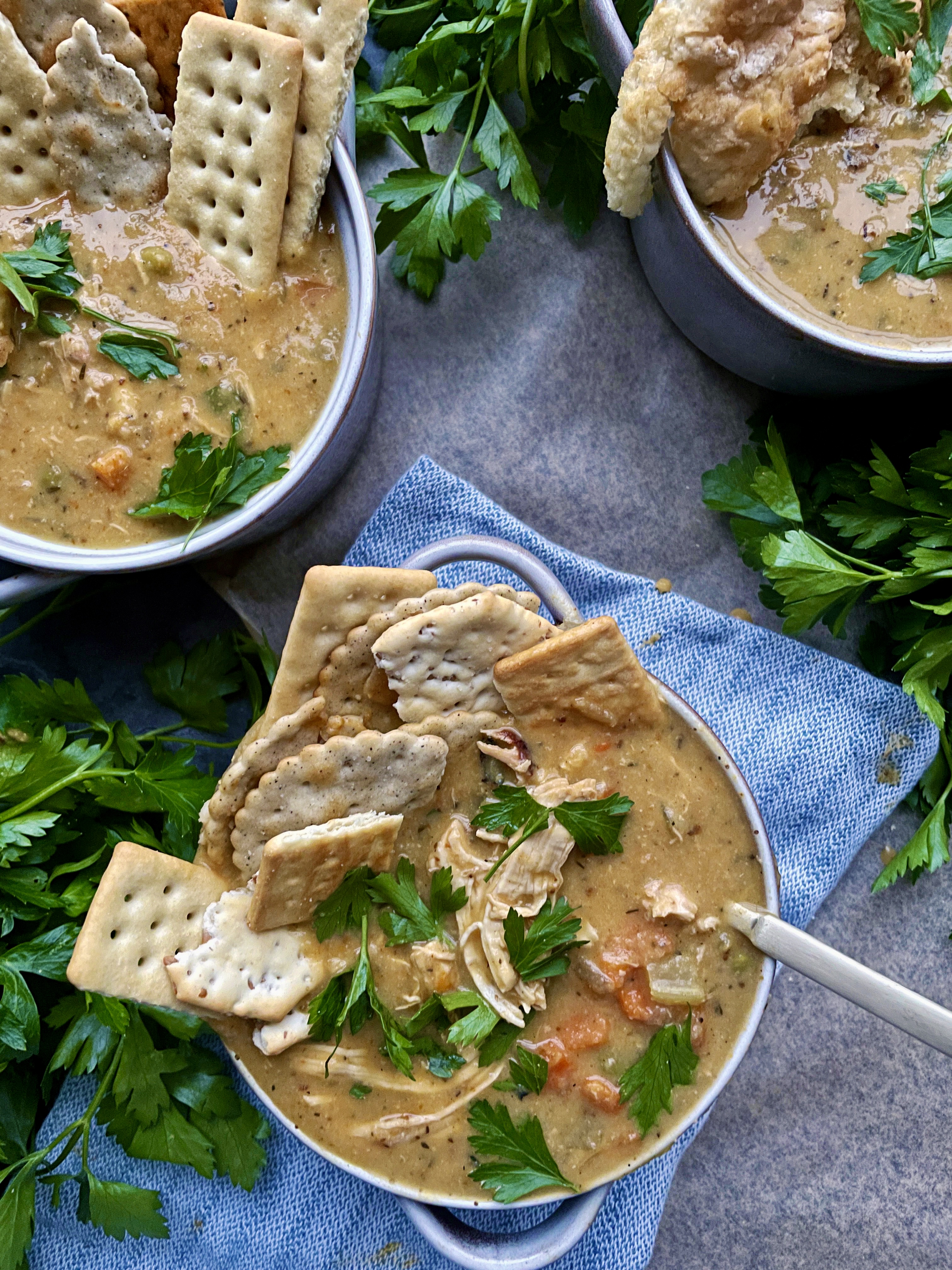 The creamy, nostalgic chicken and veggie pie lightened up in the most flavorful cozy soup of the season: I could eat this Healthier Chicken Pot Pie Soup every day this time of year!