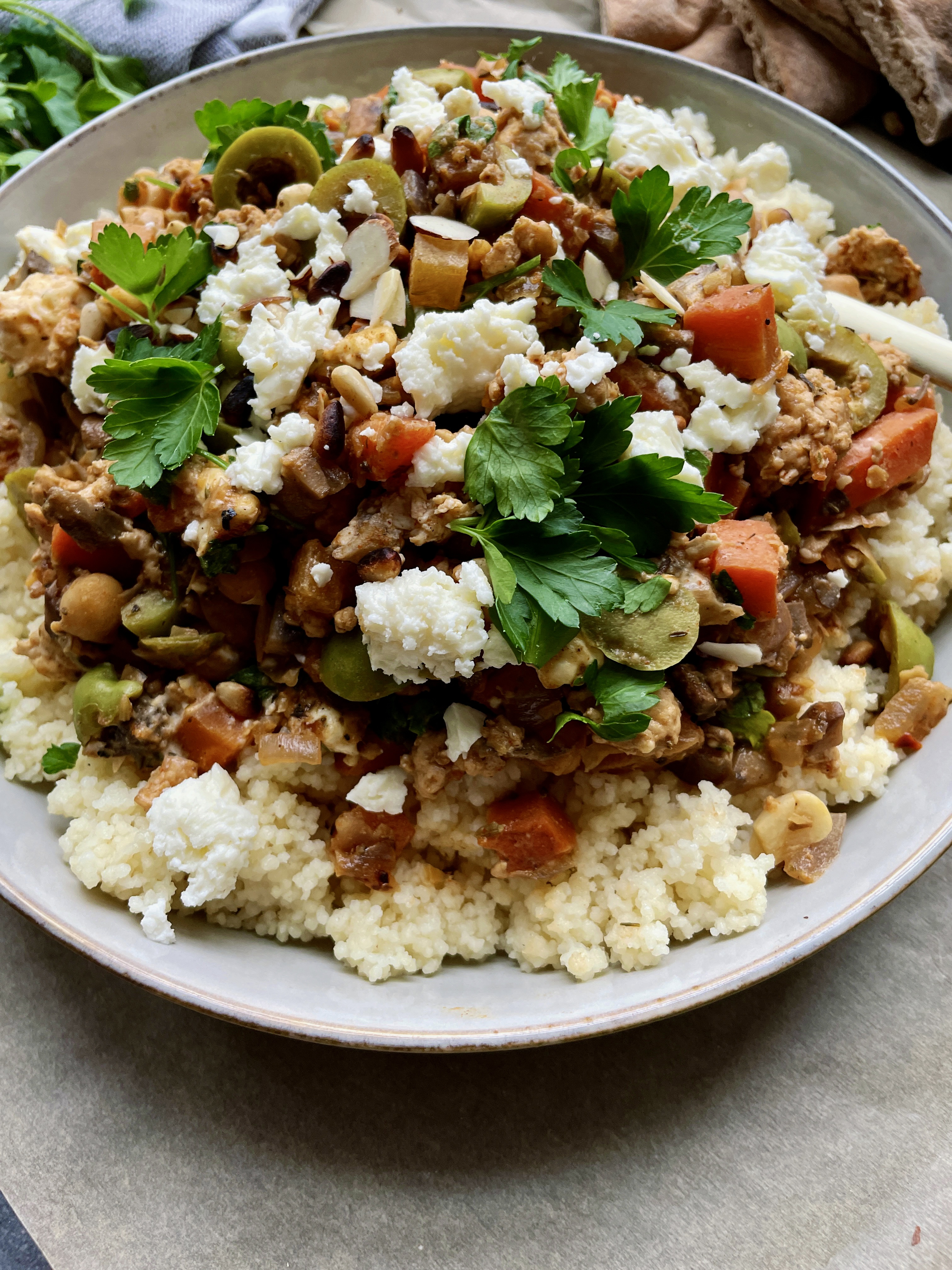 With allll the spices, golden chickpeas, some tangy Castelvetrano olives, and a good bit of creamy feta and labneh, these Moroccan Chicken Larb Couscous Bowls are the absolute best way to devour ground chicken and veggies!