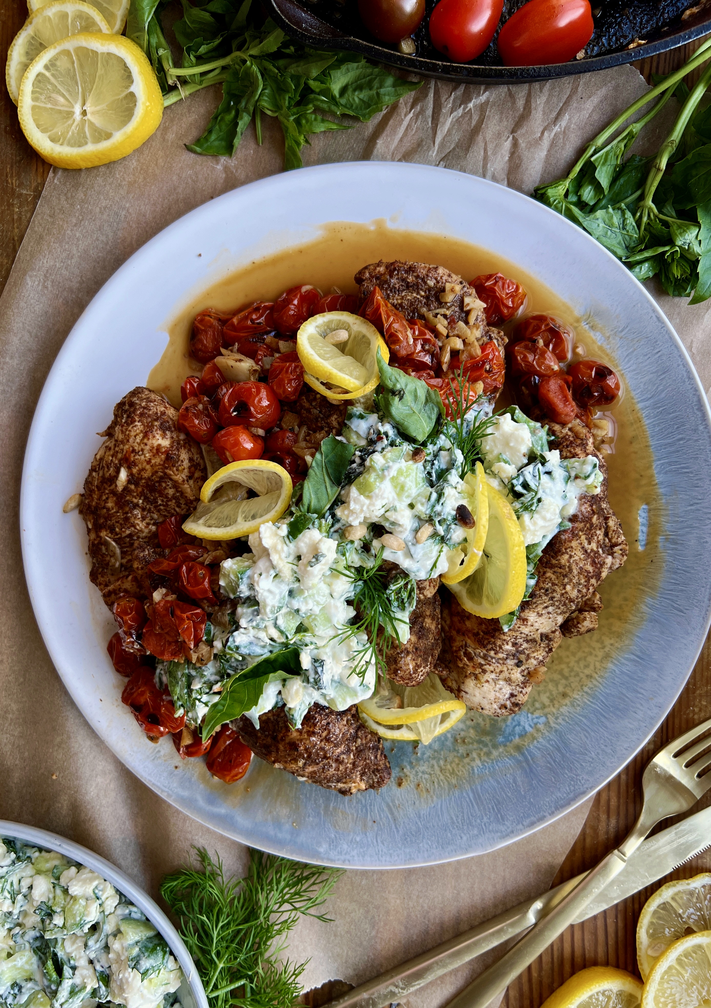  The easiest lemony sumac skillet chicken and tomatoes cooked down in garlicky white wine and finished with a cucumber mashed basil and mint feta: this Garlic Chicken with Roasted Tomatoes and Herbed Feta is truly my busy weeknight secret weapon. 