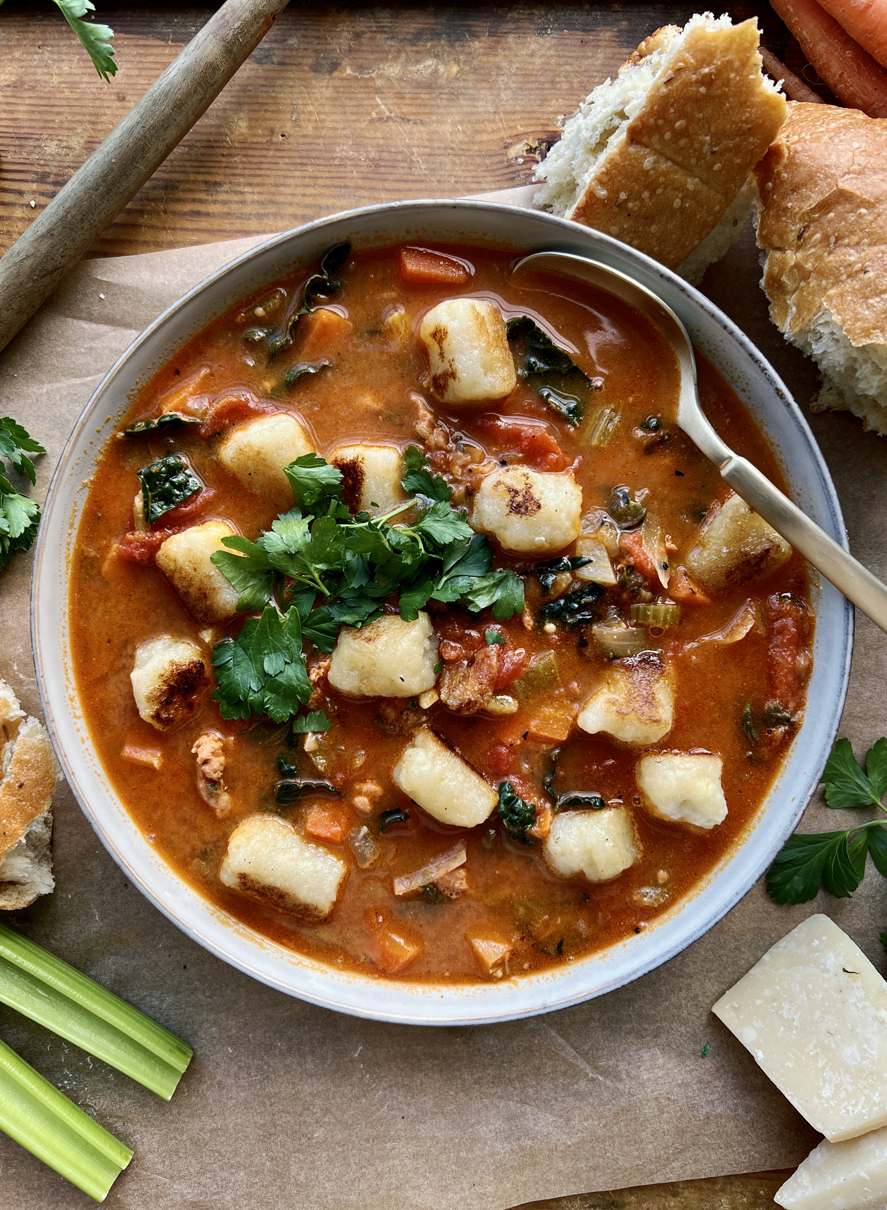 The warm and cozy yet hearty and healthy tomato based soup filled with veggies, white wine, and all the pillowy gnocchi: this Italian Sausage Tomato and Gnocchi Soup is truly getting me through this winter!