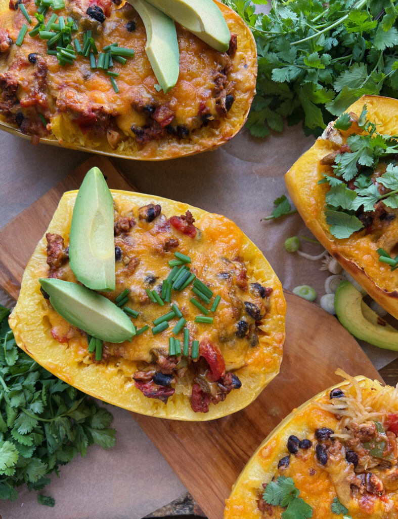  Warming spices mixed up in sautéed veggies, beans, tangy chiles, and all the cheese cooked down in a tomato sauce and tucked into roasted spaghetti squash boats: these Mexican Cheesy Bean and Turkey Spaghetti Squash Boats are everyone’s favorite dinner!