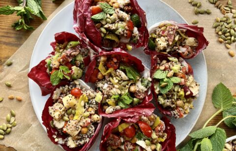 All the best fresh, Italian ingredients stuffed into some bitter, bright purple radicchio with quinoa, double the cheese, and so much flavor: these LA Chop Quinoa Radicchio Wraps are the perfect healthy lunch or dinner!