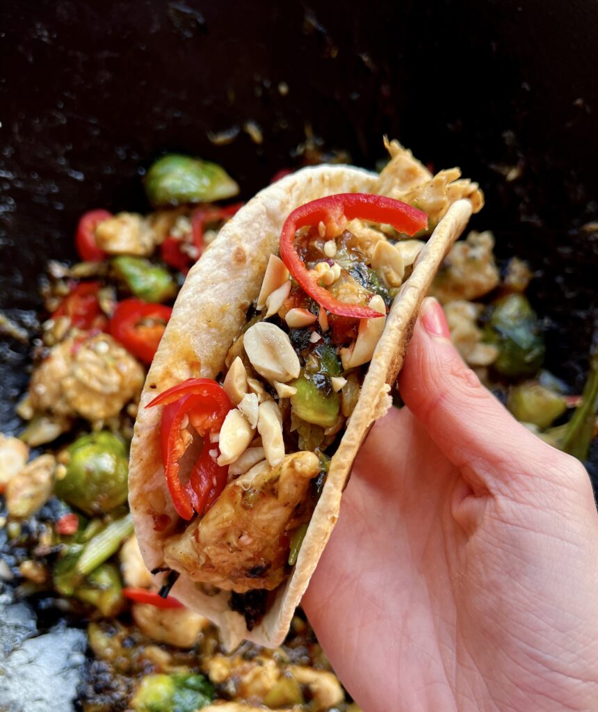  The saucy, spicy wok fried chicken and brussels sprouts tucked into an easy homemade crispy tortilla shell with all the fresh bites: I could eat these Spicy Mongolian Crispy Chicken and Brussels Tacos every day!