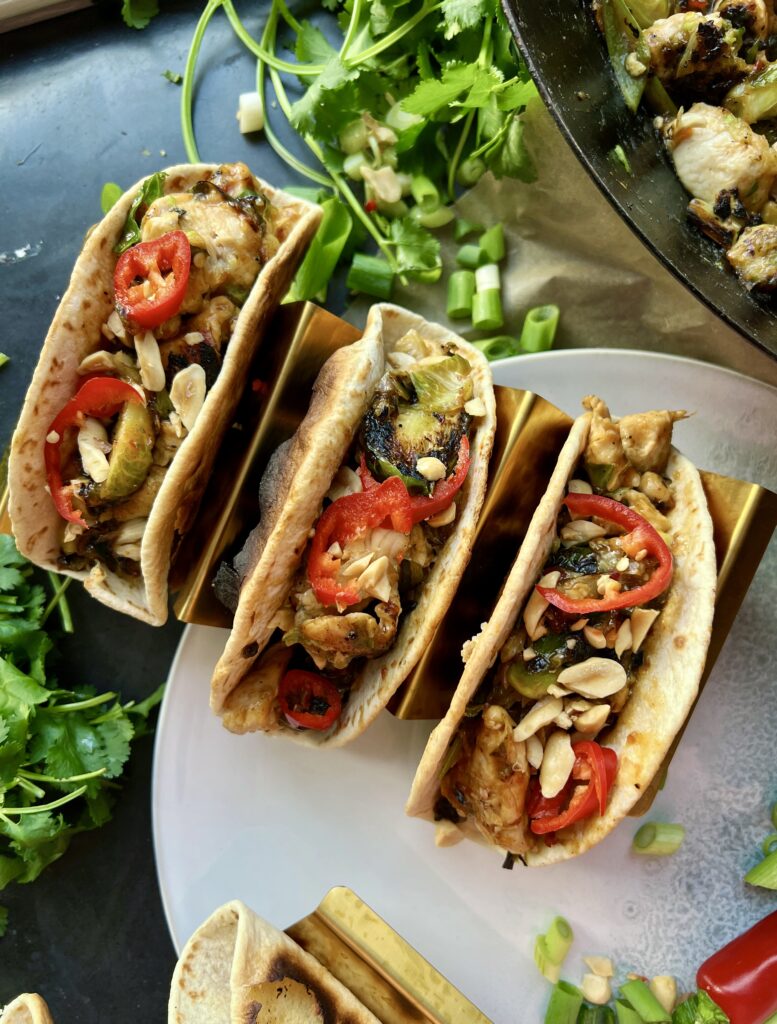  The saucy, spicy wok fried chicken and brussels sprouts tucked into an easy homemade crispy tortilla shell with all the fresh bites: I could eat these Spicy Mongolian Crispy Chicken and Brussels Tacos every day!