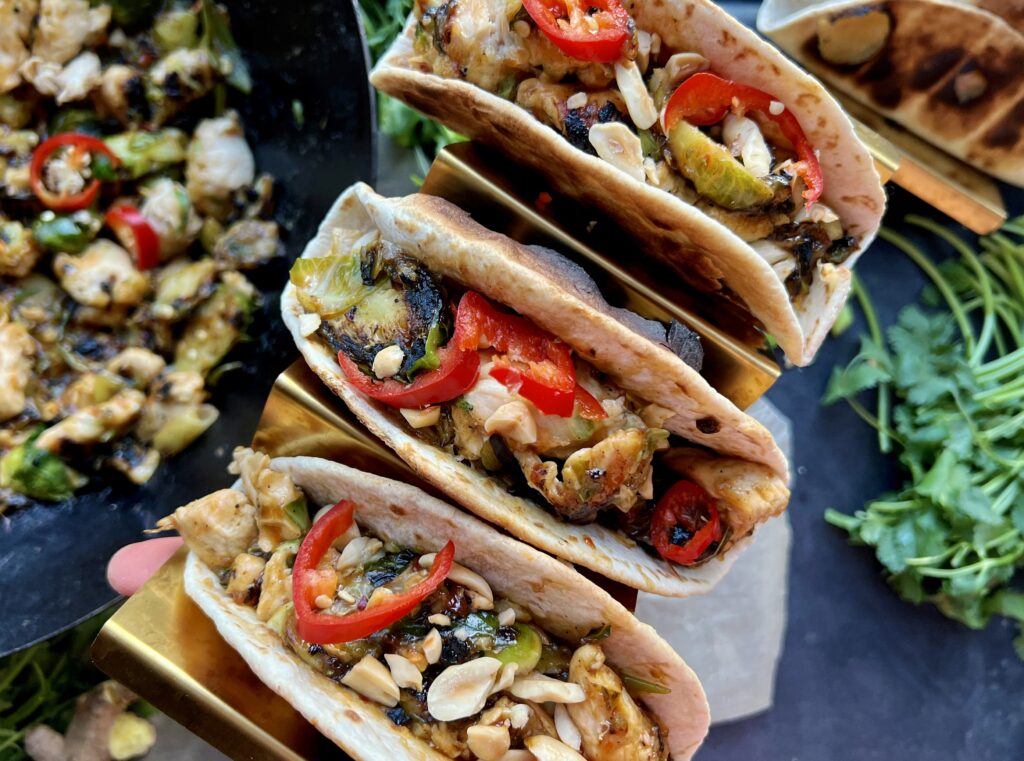  The saucy, spicy wok fried chicken and brussels sprouts tucked into an easy homemade crispy tortilla shell with all the fresh bites: I could eat these Spicy Mongolian Crispy Chicken and Brussels Tacos every day!