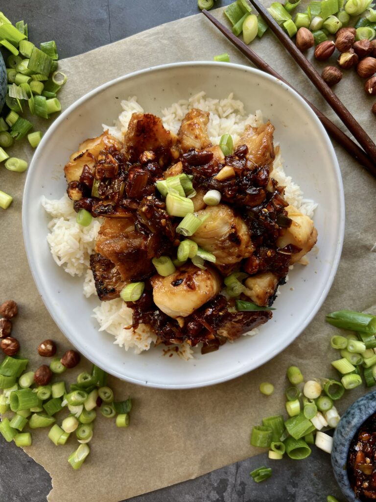 Juicy sesame miso marinated cod bites crisped up on the stove with a simple shallot hazelnut spicy crunch and served over your favorite rice: these Shallot Chili Crunch Miso Cod Bites are the best easy dinner.